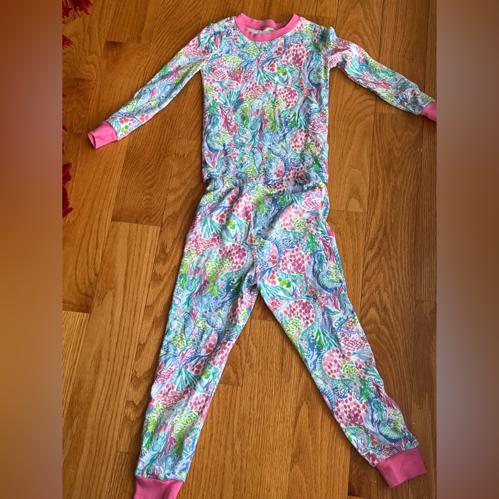 Colorful Patterned Onesie with Pink Accents